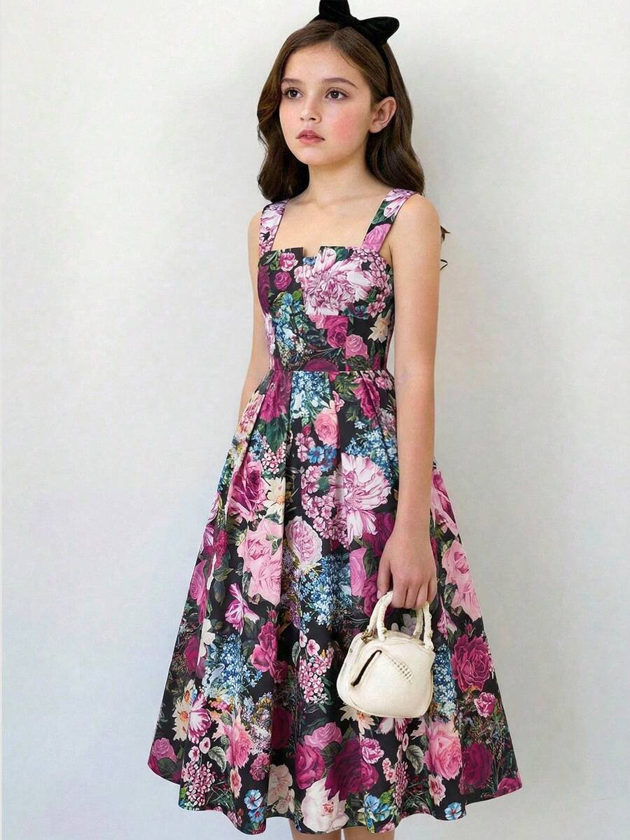 Tween girl apricot floral print midi dress with ruffle shoulder straps, shirred detail, and high waist A-line fit.