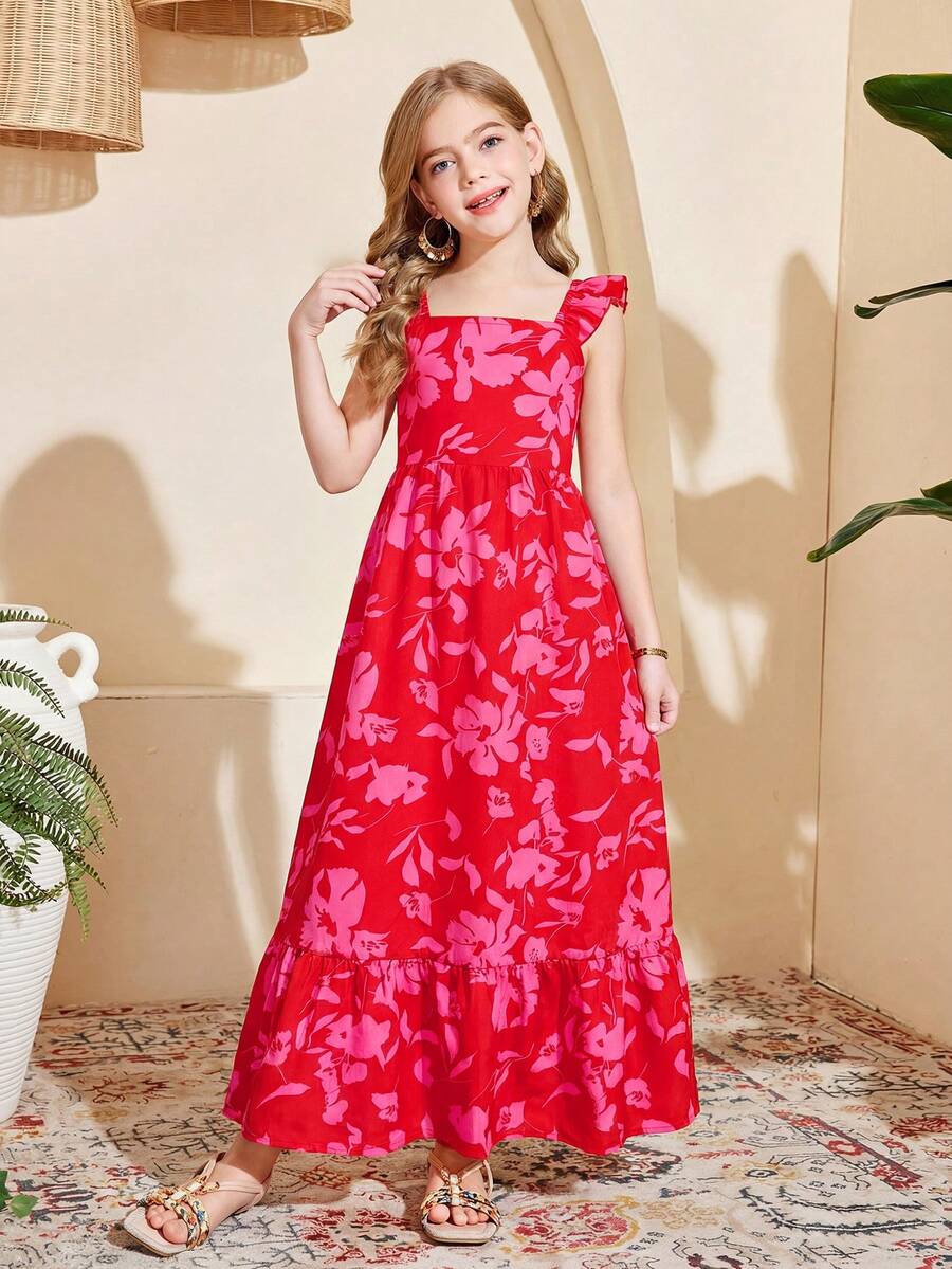 Blue floral print long vacation dress for tween girls featuring an A-line high waist silhouette with ruffle details and spaghetti straps.