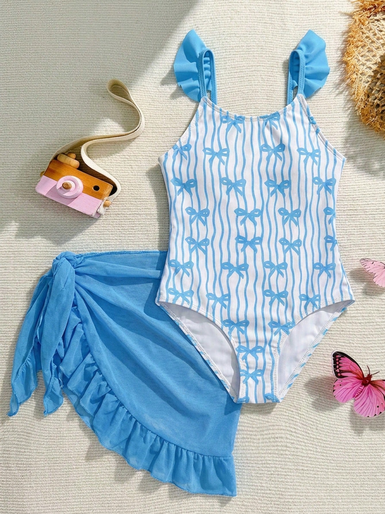 Tween girls one-piece swimsuit in leopard print with ruffle shoulder straps, scoop neckline, fitted shape, and attached ruffle hem skirt; sleeveless, mid-waist skirt bottom, and lined body for swimming, vacation, and summer beach wear.