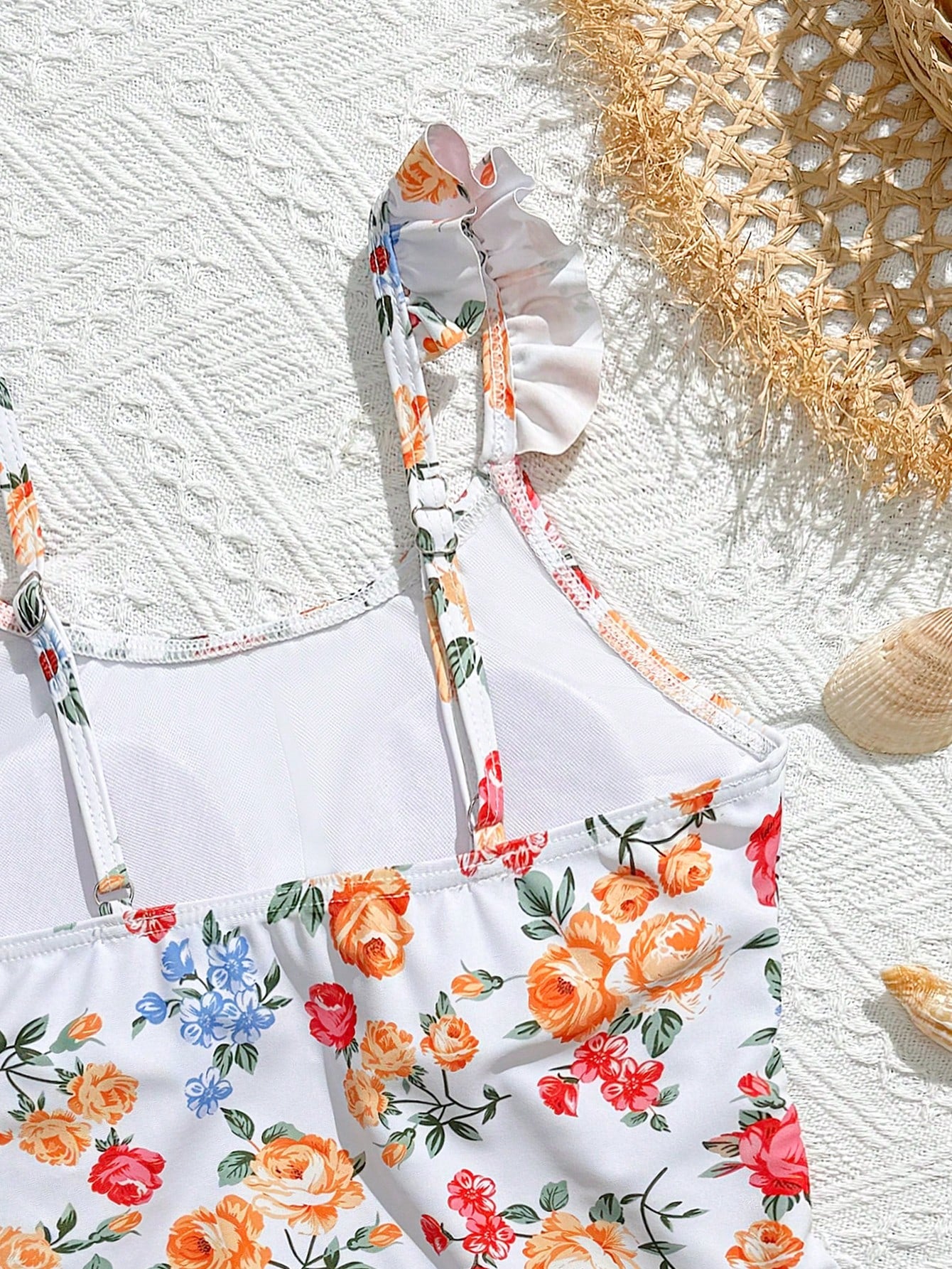 Tween girls multicolor one piece swimsuit set with spaghetti straps, ruffle detail, animal marine life print, and matching mesh cover skirt for summer vacation swimwear.