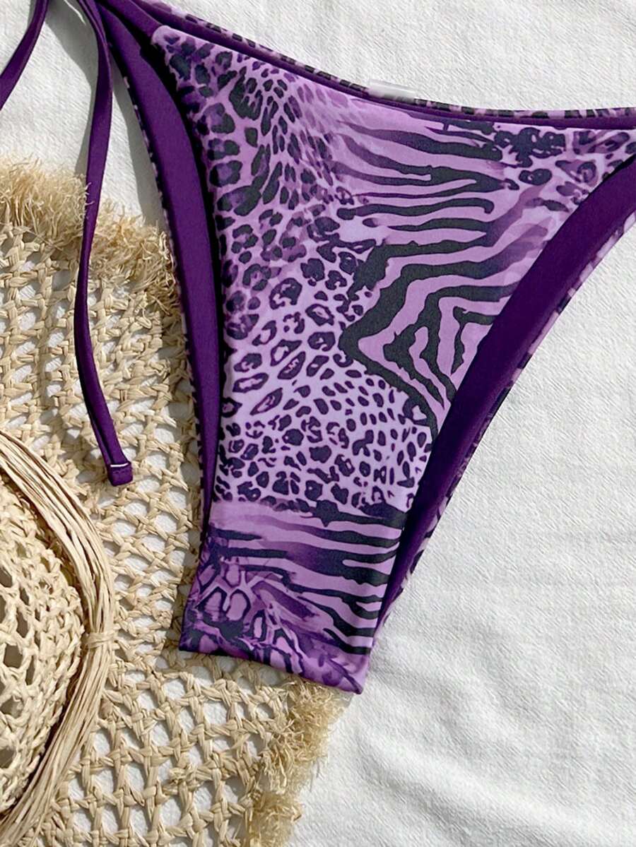 Women's vintage leopard print 2-piece bikini set featuring a high waist tie-side bottom and a halter neck triangle top.