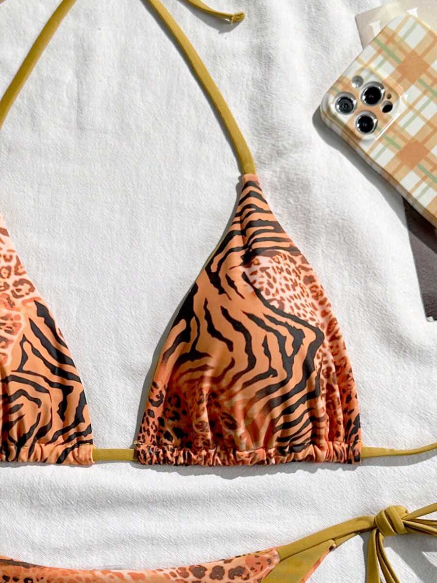 Women's vintage leopard print 2-piece bikini set featuring a high waist tie-side bottom and a halter neck triangle top.