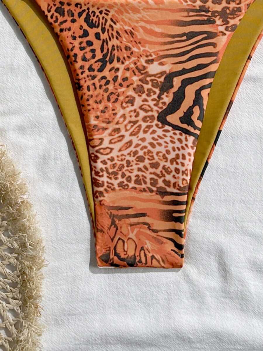 Women's vintage leopard print 2-piece bikini set featuring a high waist tie-side bottom and a halter neck triangle top.