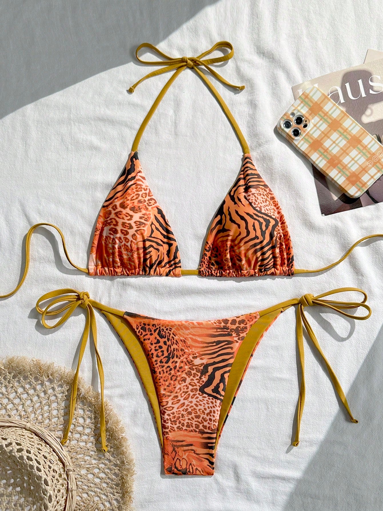 Women's vintage leopard print 2-piece bikini set featuring a high waist tie-side bottom and a halter neck triangle top.