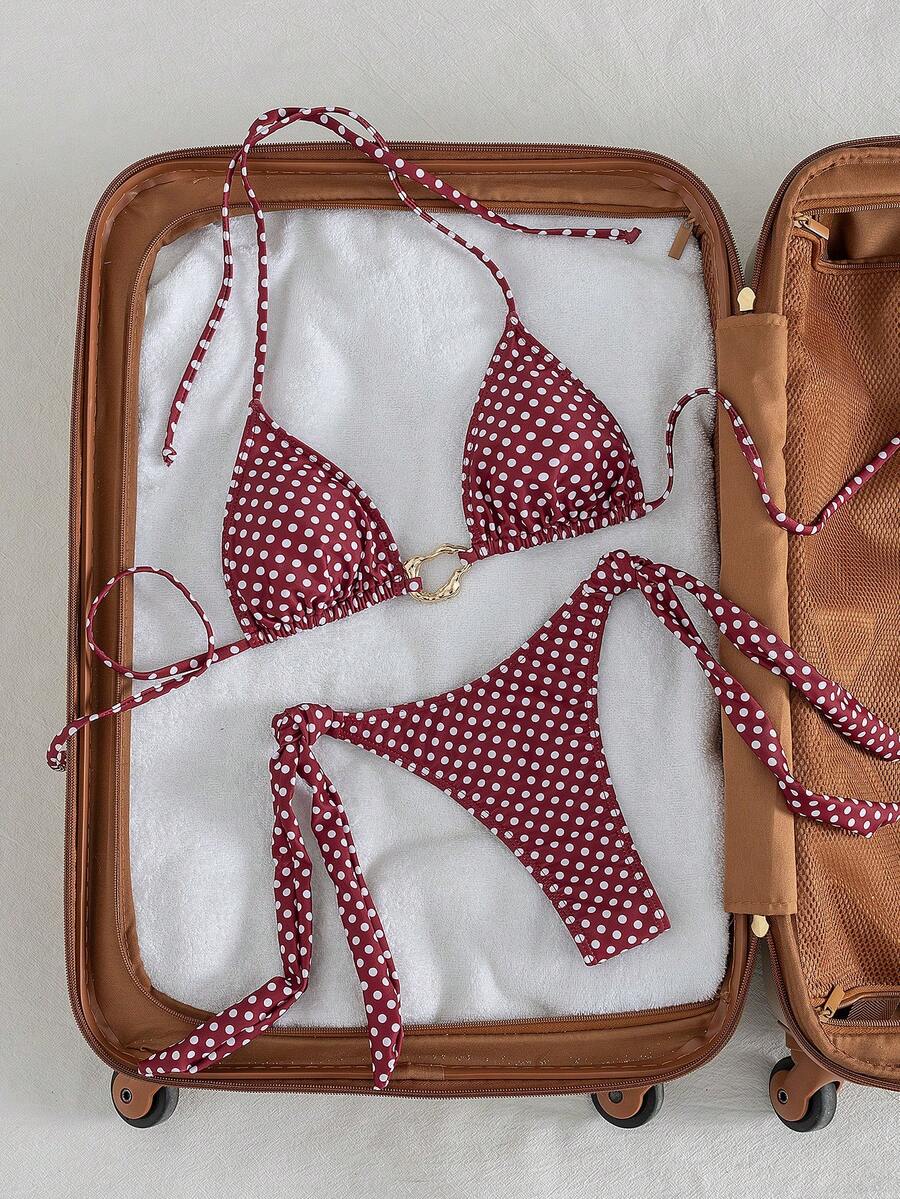 Red halter tie-side bikini set for women featuring a geometric plaid pattern, high-waisted bottoms, wireless triangle cups, and removable padding.