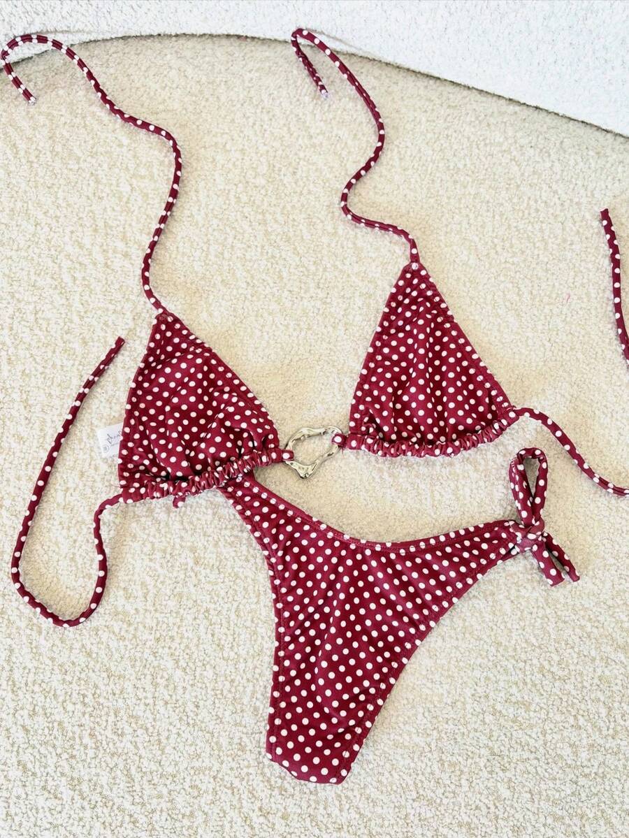 Red halter tie-side bikini set for women featuring a geometric plaid pattern, high-waisted bottoms, wireless triangle cups, and removable padding.