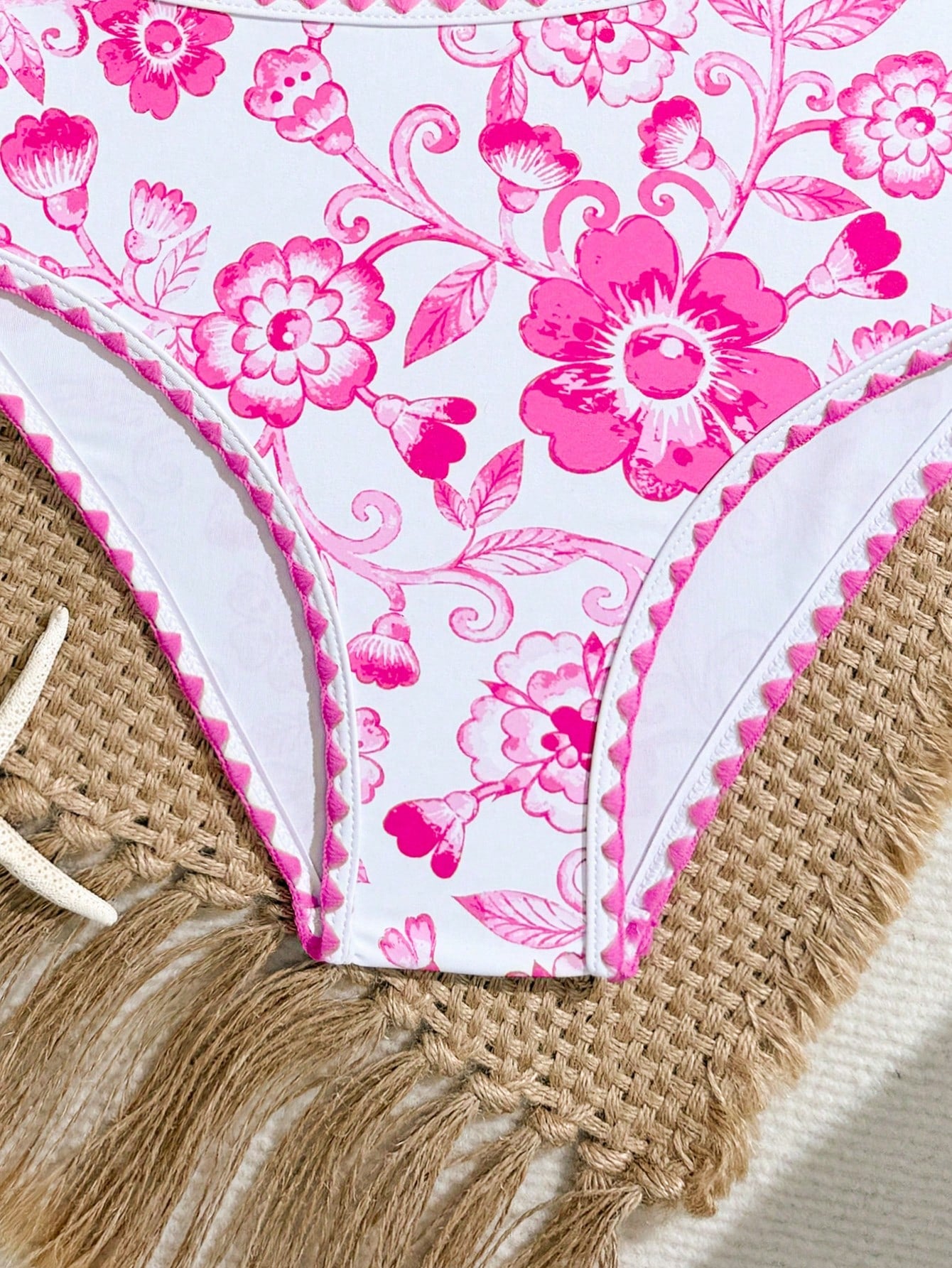 Tween girls one-piece swimsuit featuring an asymmetric neckline, pendant decor, plain design, wireless bra, high-cut bottom, and medium-stretch fabric.