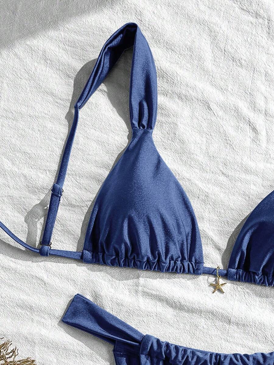 Women's 2-piece triangle cup bikini set in solid color featuring woven pearl shell decoration, halter neckline, and high-waist side-tie ruched bottoms.