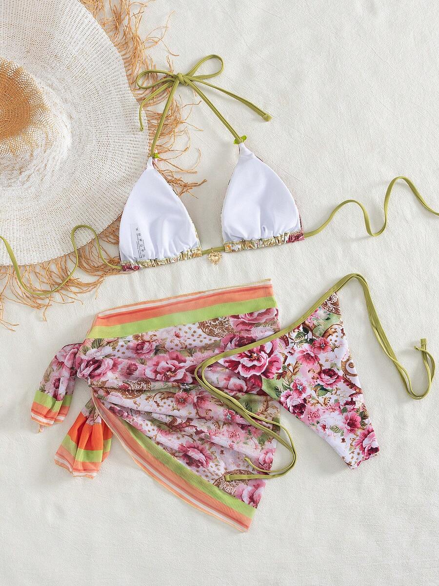 Women's 3-piece pink floral print bikini set featuring a wireless halter top with removable padding and matching tie-side swim bottoms.