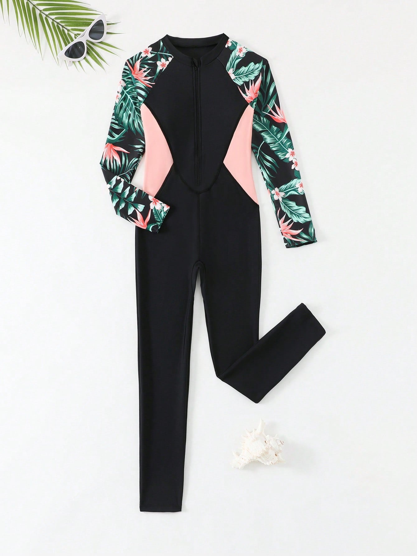 Tween girls black one-piece swimsuit with long sleeves, high neck, zipper detail, graphic leopard heart print, and fitted full-coverage swimwear style.