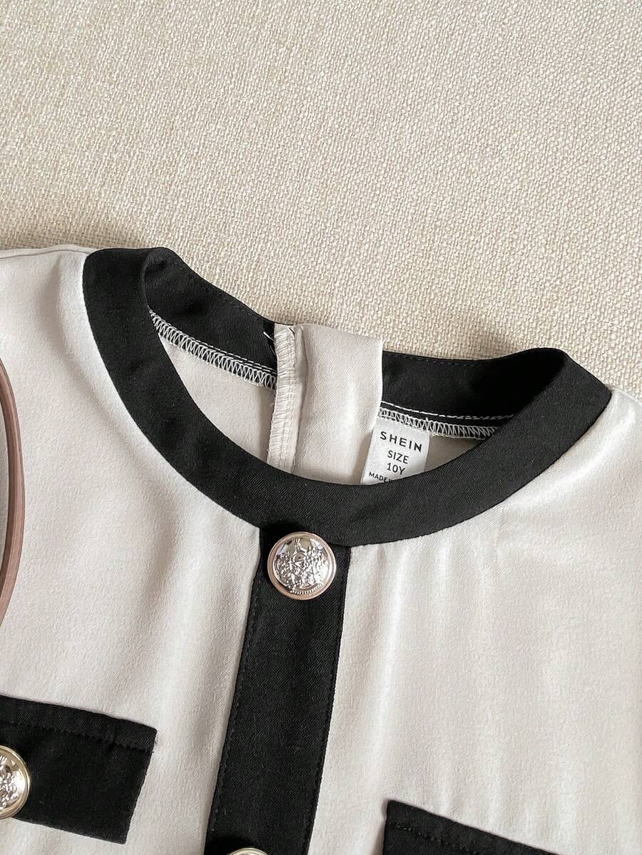 Nova Glow tween girls black and white houndstooth print short sleeve A-line dress with decorative buttons and crew neckline.