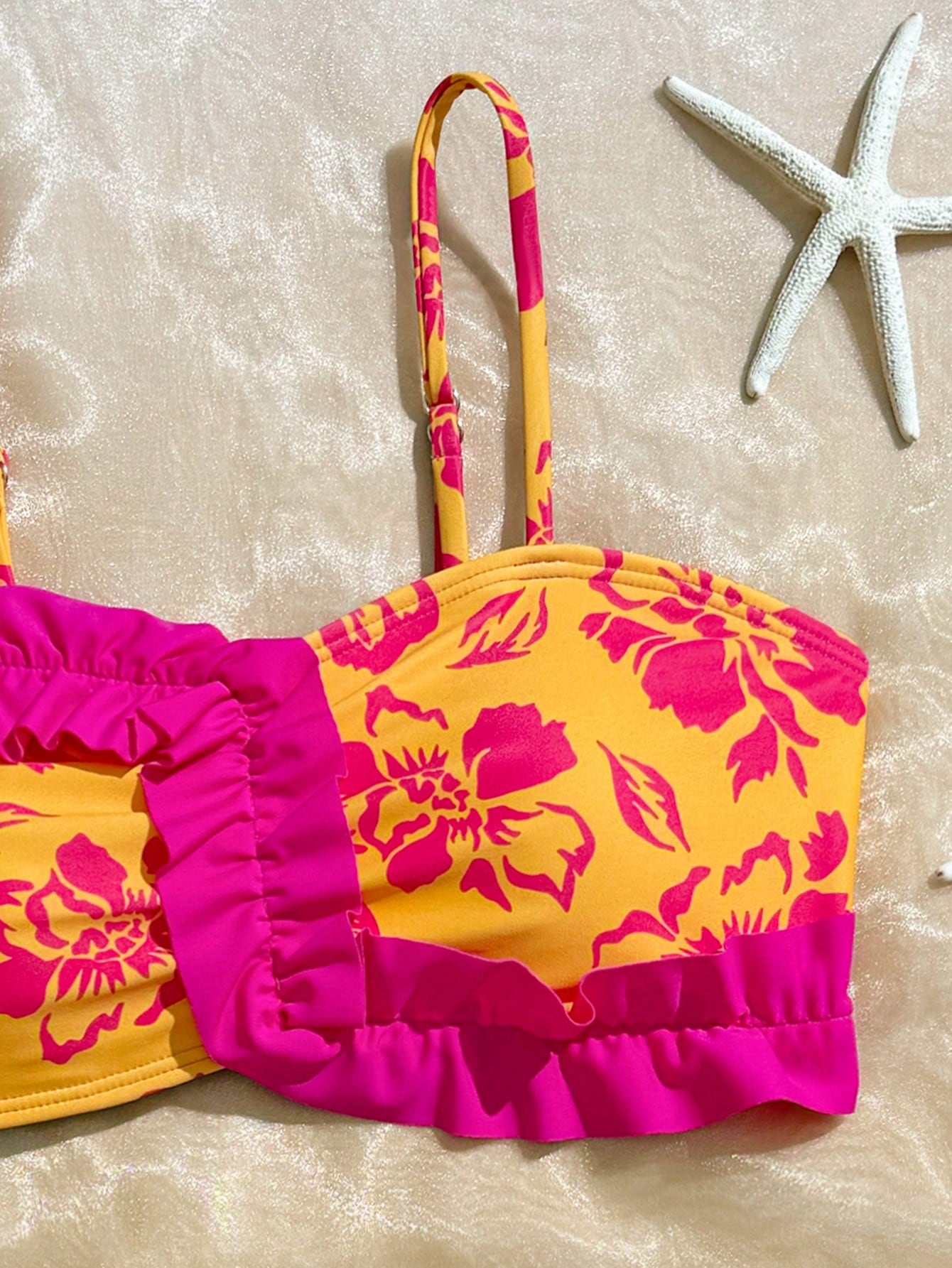 Tween girls bikini set with shell and starfish woven band details, spaghetti strap sleeveless top, and mid-waist skirt-style bottom in blue.