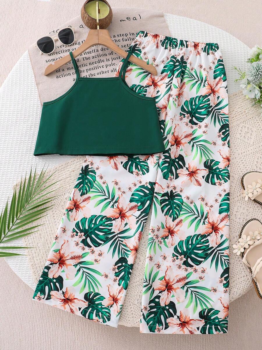 Tween girls blue 2-piece vacation outfit set featuring a tiered ruffle spaghetti strap camisole and loose high-waist pants.