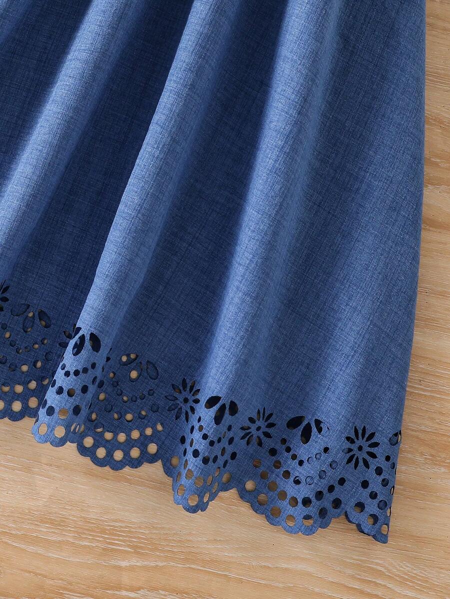 Tween girls dusty blue casual A-line dress with round neck, ruffle accents, high waist, and flared hem.