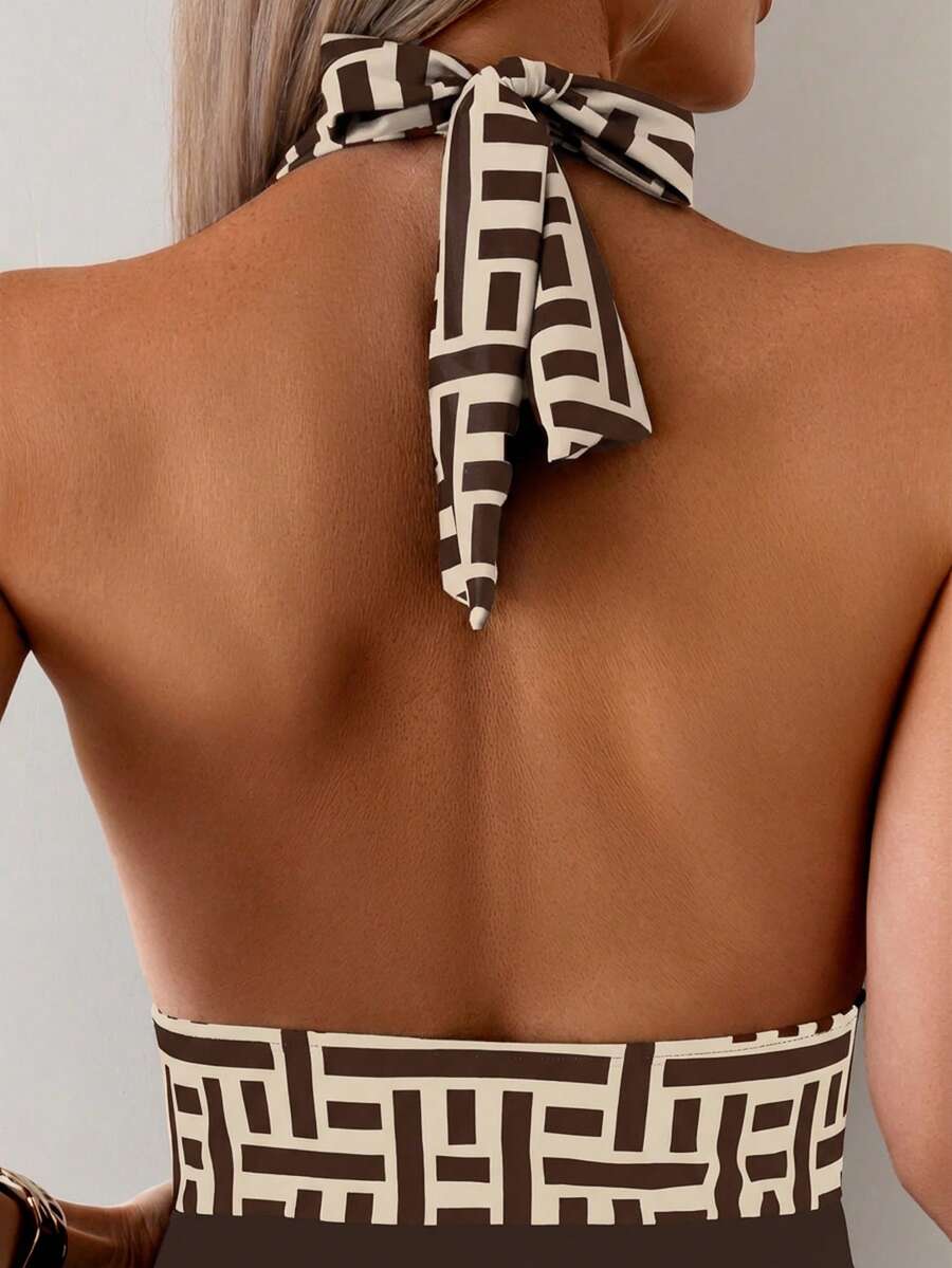 Apricot women's one-piece swimsuit featuring a halter neckline, backless tie-back detail, and ruched knitted fabric.