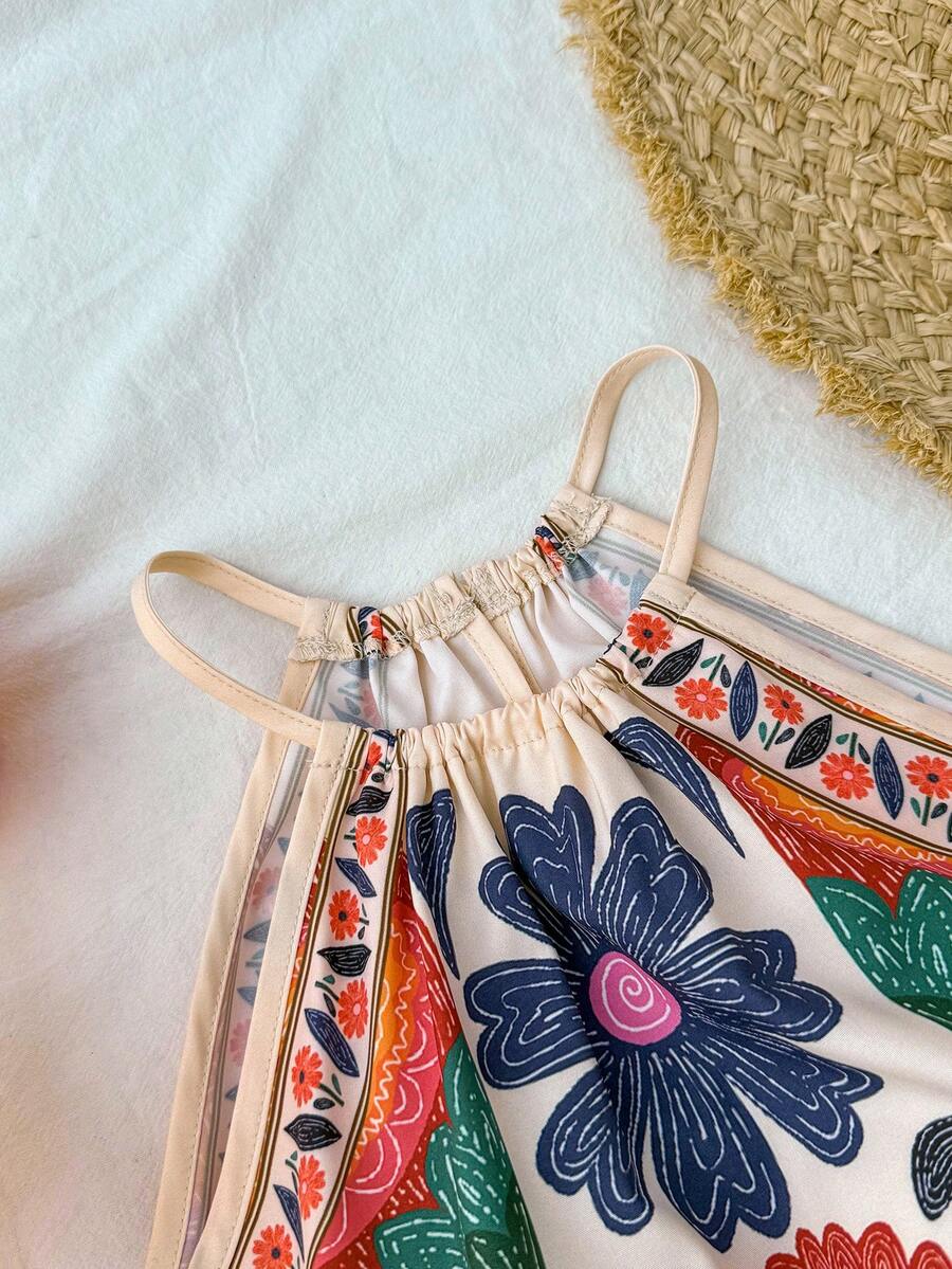 Tween girls floral halter A-line dress with contrast lace, applique and fringe details, sleeveless short length in polyester