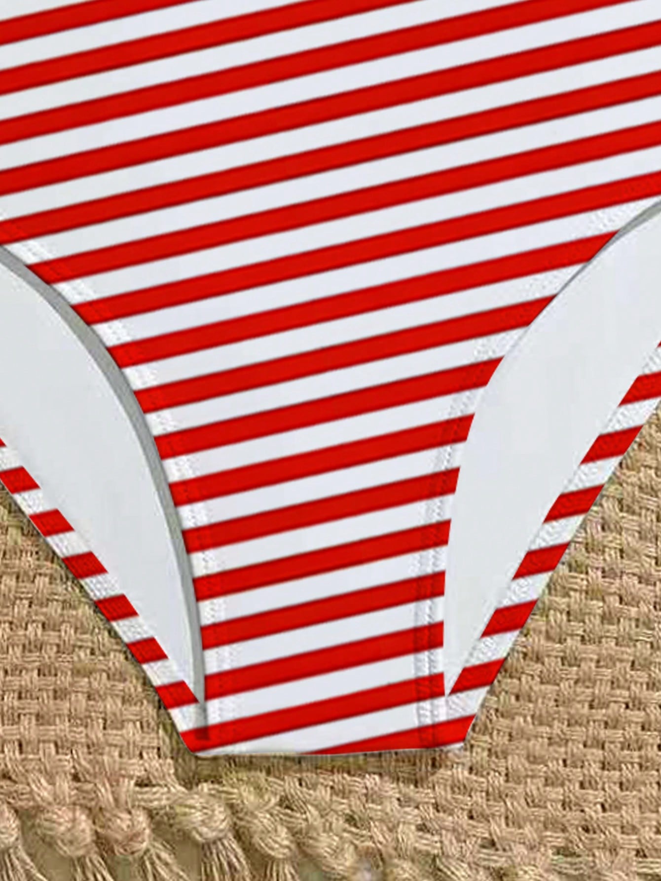 Purple tween girls one-piece swimsuit with asymmetrical neckline, cut-out waist, striped pattern, fitted silhouette, and lined body.