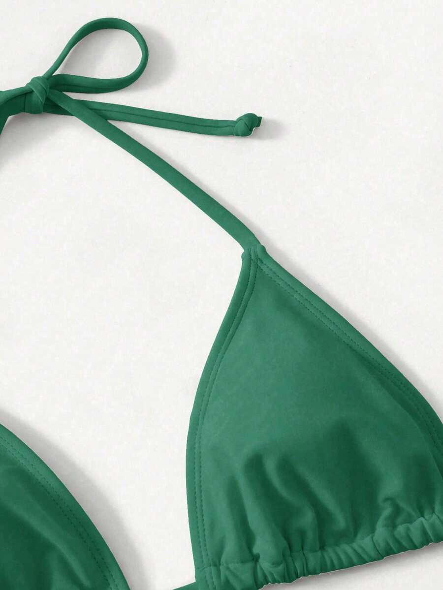 Women's high waist halter tie bikini swimwear set featuring triangle cups, wireless bra with removable padding, and tie side bottoms.