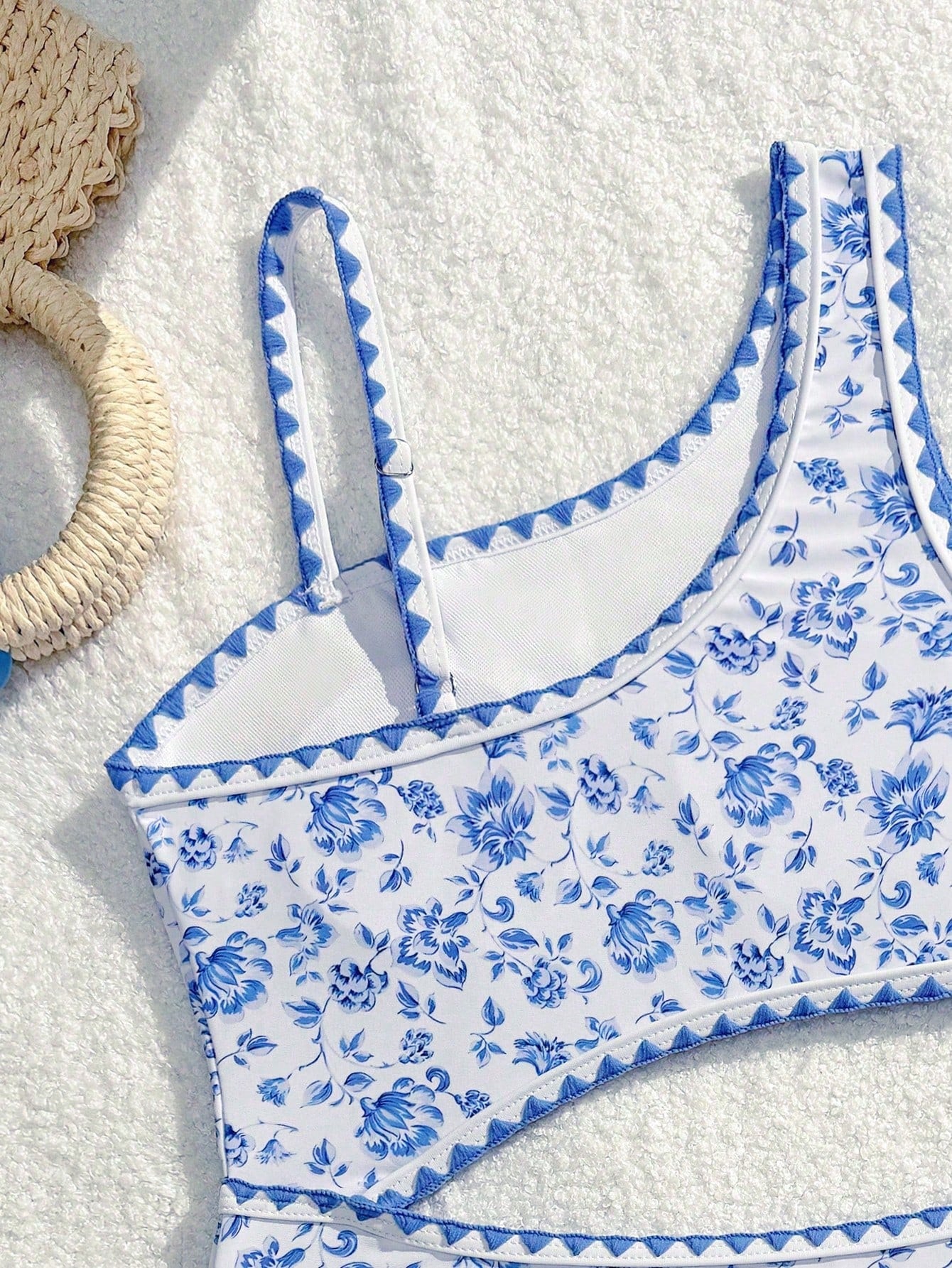 Tween girls one-piece swimsuit featuring an asymmetric neckline, pendant decor, plain design, wireless bra, high-cut bottom, and medium-stretch fabric.