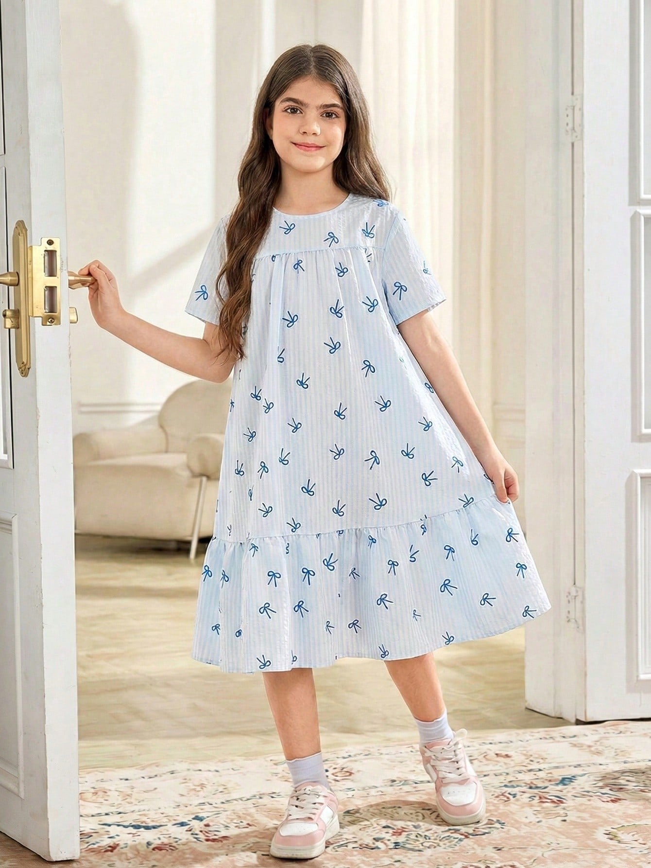 Tween girls casual black and white striped short sleeve smock dress with round neck and flounce hem