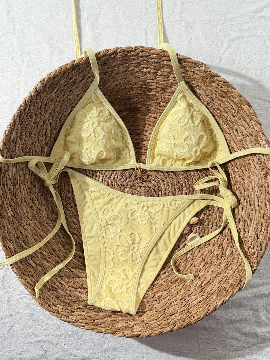 Women's apricot solid halter tie bikini top with triangle cups and matching tie-side swimsuit bottoms.