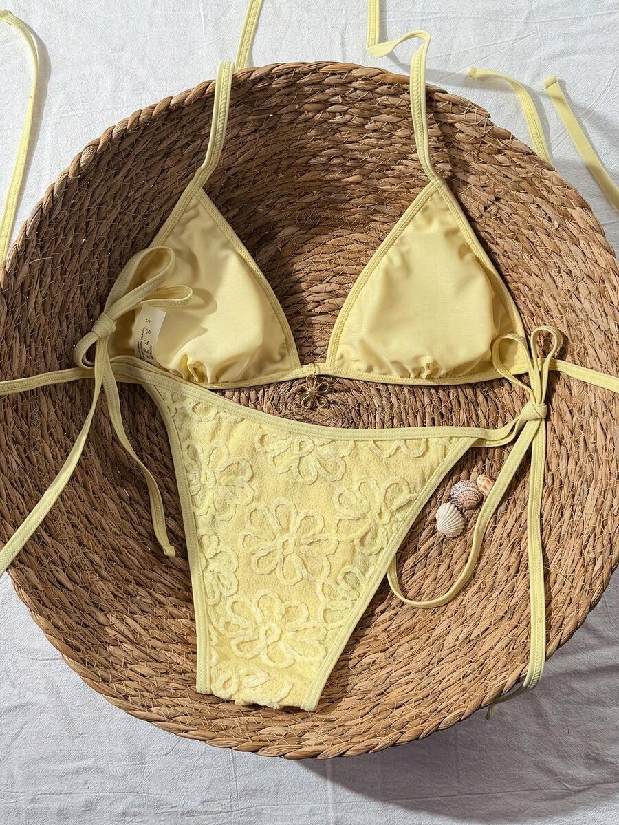 Women's apricot solid halter tie bikini top with triangle cups and matching tie-side swimsuit bottoms.