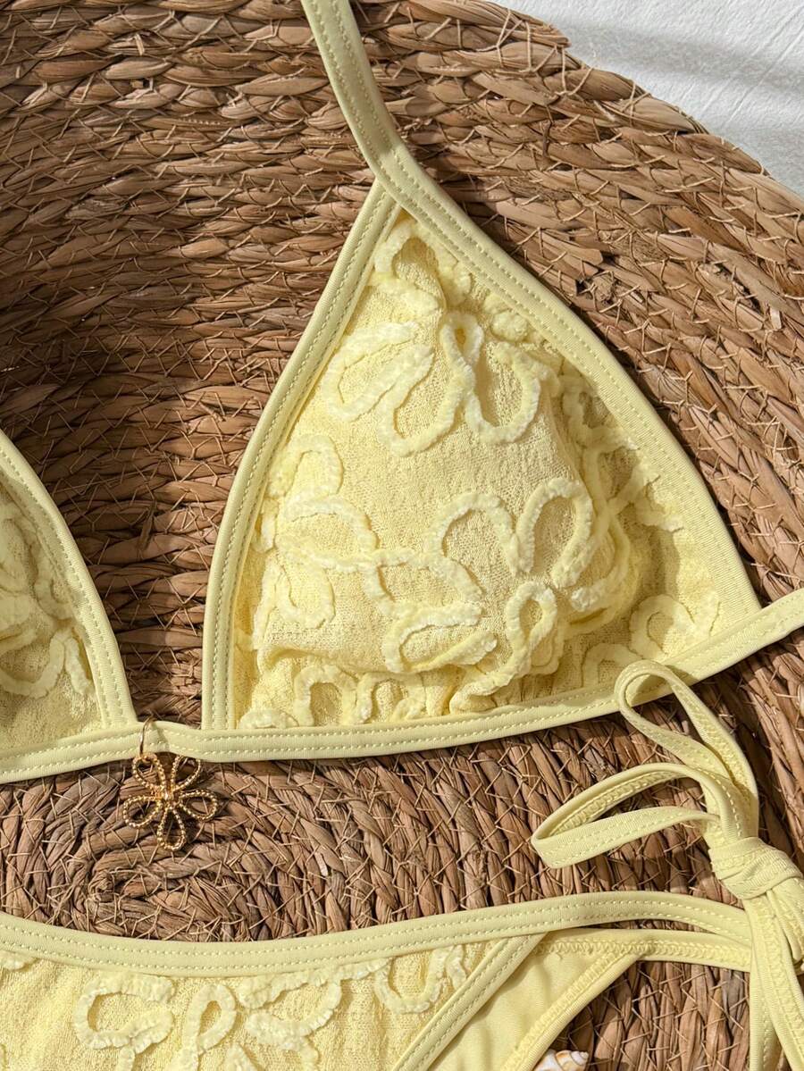 Women's apricot solid halter tie bikini top with triangle cups and matching tie-side swimsuit bottoms.