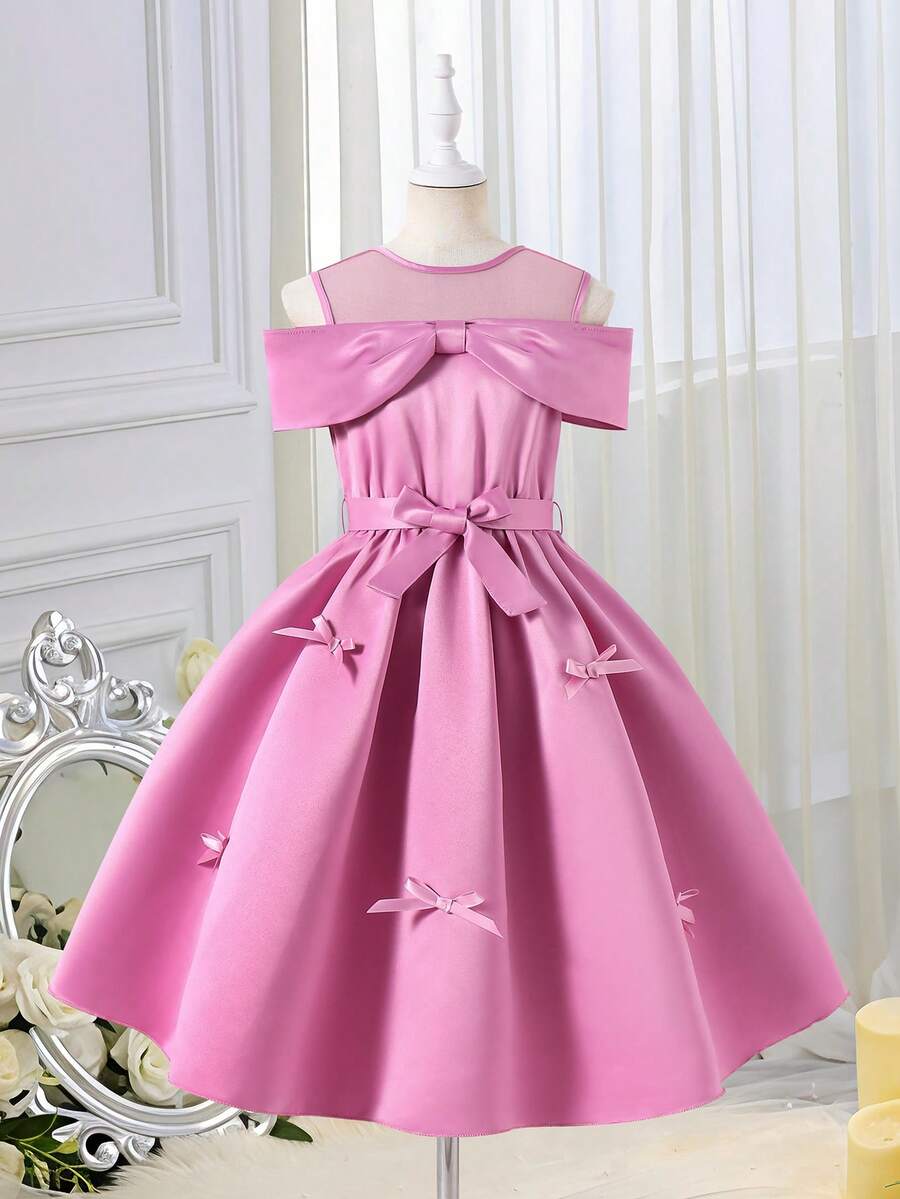 Tween girls dusty blue casual A-line dress with round neck, ruffle accents, high waist, and flared hem.