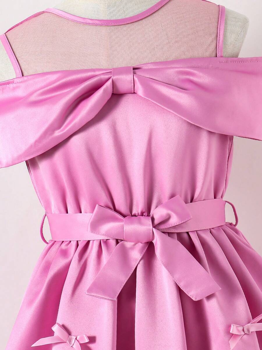 Tween girls dusty blue casual A-line dress with round neck, ruffle accents, high waist, and flared hem.