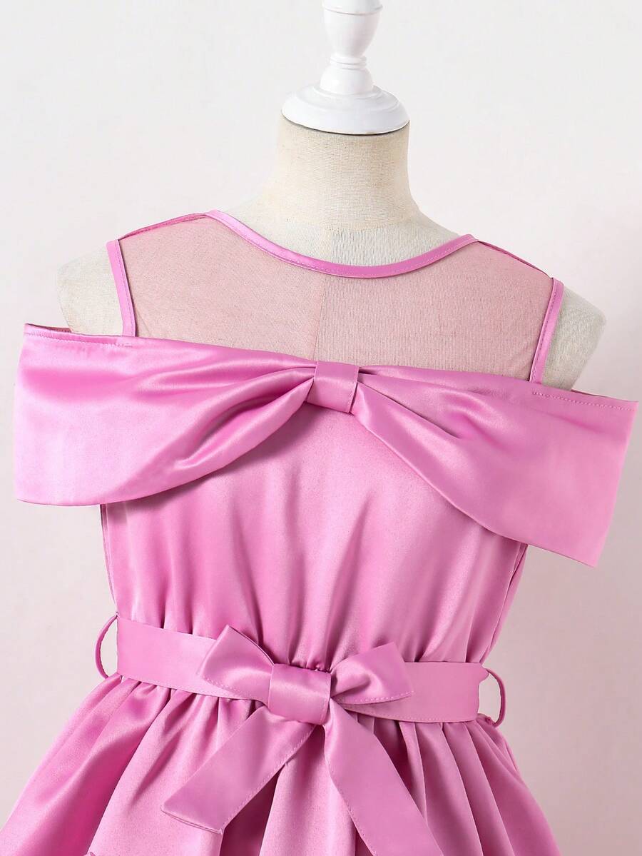 Tween girls dusty blue casual A-line dress with round neck, ruffle accents, high waist, and flared hem.