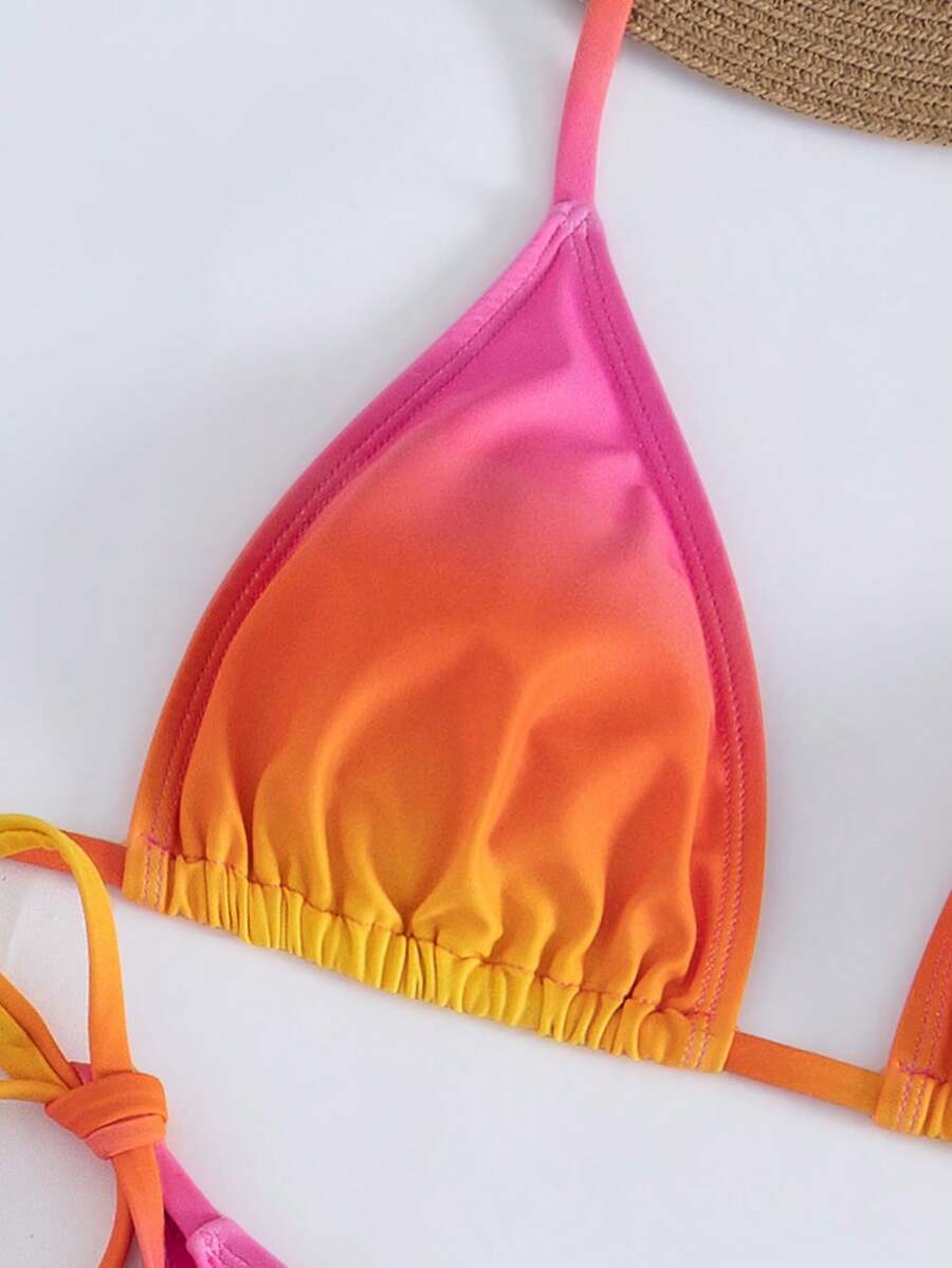 Women's 3-piece gradient bikini set featuring a green halter tie top with removable padding, low waist bottoms, and a matching sheer mesh skirt.