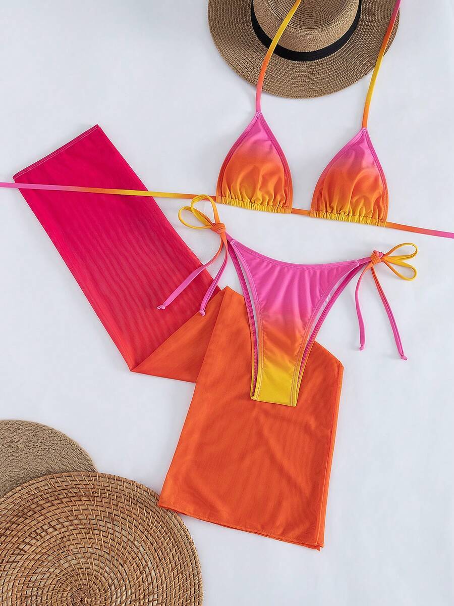 Women's 3-piece gradient bikini set featuring a green halter tie top with removable padding, low waist bottoms, and a matching sheer mesh skirt.