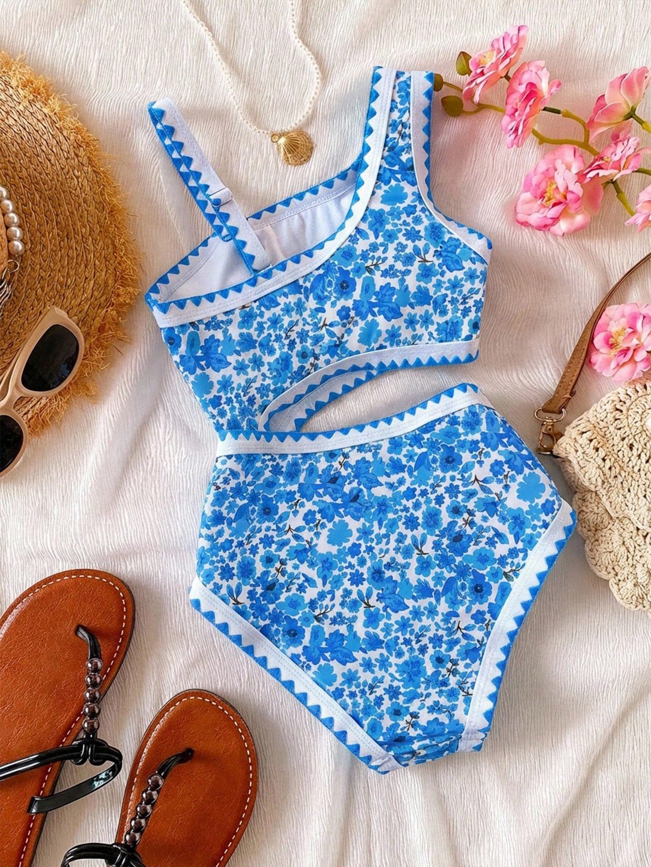 Tween girls one-piece swimsuit featuring an asymmetric neckline, pendant decor, plain design, wireless bra, high-cut bottom, and medium-stretch fabric.