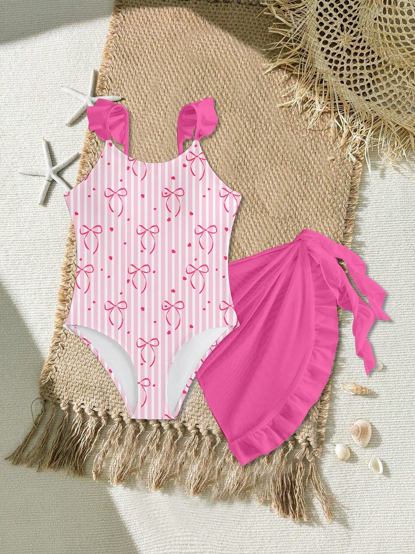 Tween girls one-piece swimsuit in leopard print with ruffle shoulder straps, scoop neckline, fitted shape, and attached ruffle hem skirt; sleeveless, mid-waist skirt bottom, and lined body for swimming, vacation, and summer beach wear.