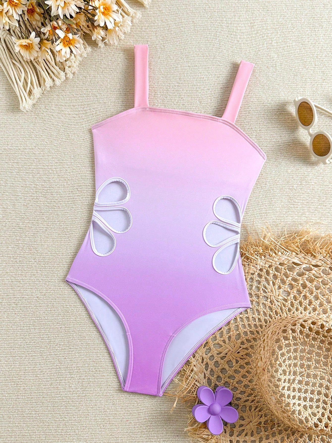 Tween girl multicolor ombre one-piece swimsuit with spaghetti straps, all-over print, lined body, and vacation beachwear style.