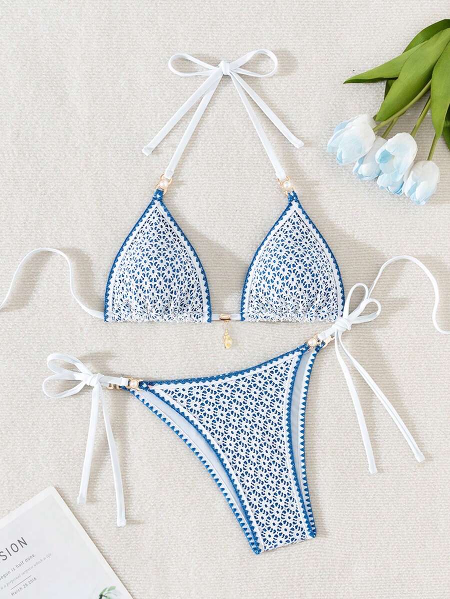 Women's triangle bikini set with contrast lace wireless bra top and ultra high waist tie side bottoms.