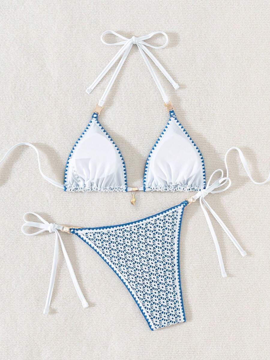 Women's triangle bikini set with contrast lace wireless bra top and ultra high waist tie side bottoms.