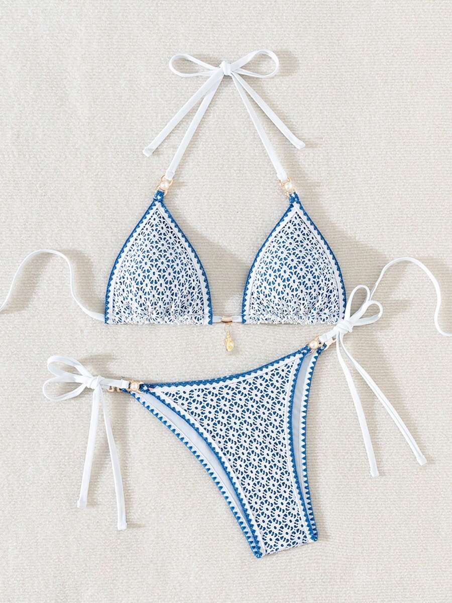 Women's triangle bikini set with contrast lace wireless bra top and ultra high waist tie side bottoms.