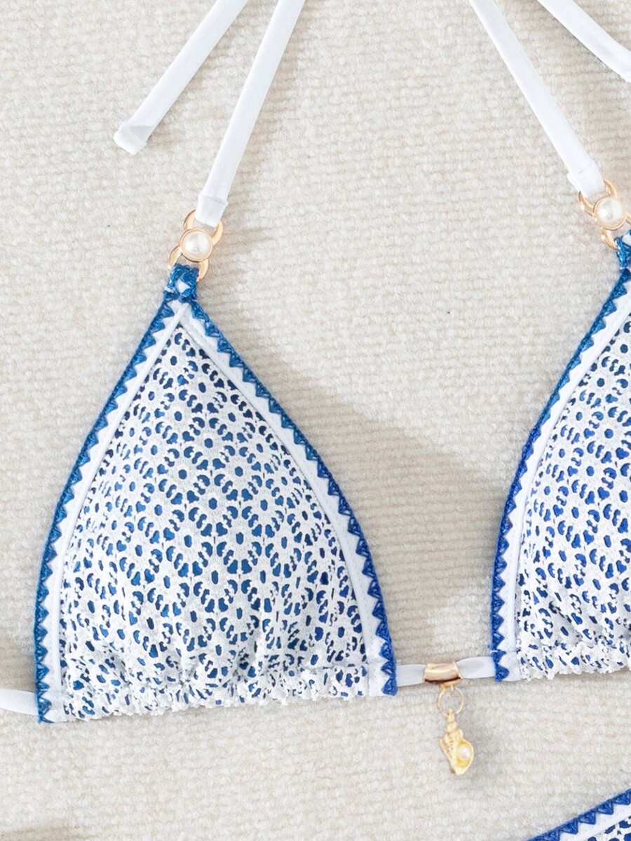 Women's triangle bikini set with contrast lace wireless bra top and ultra high waist tie side bottoms.