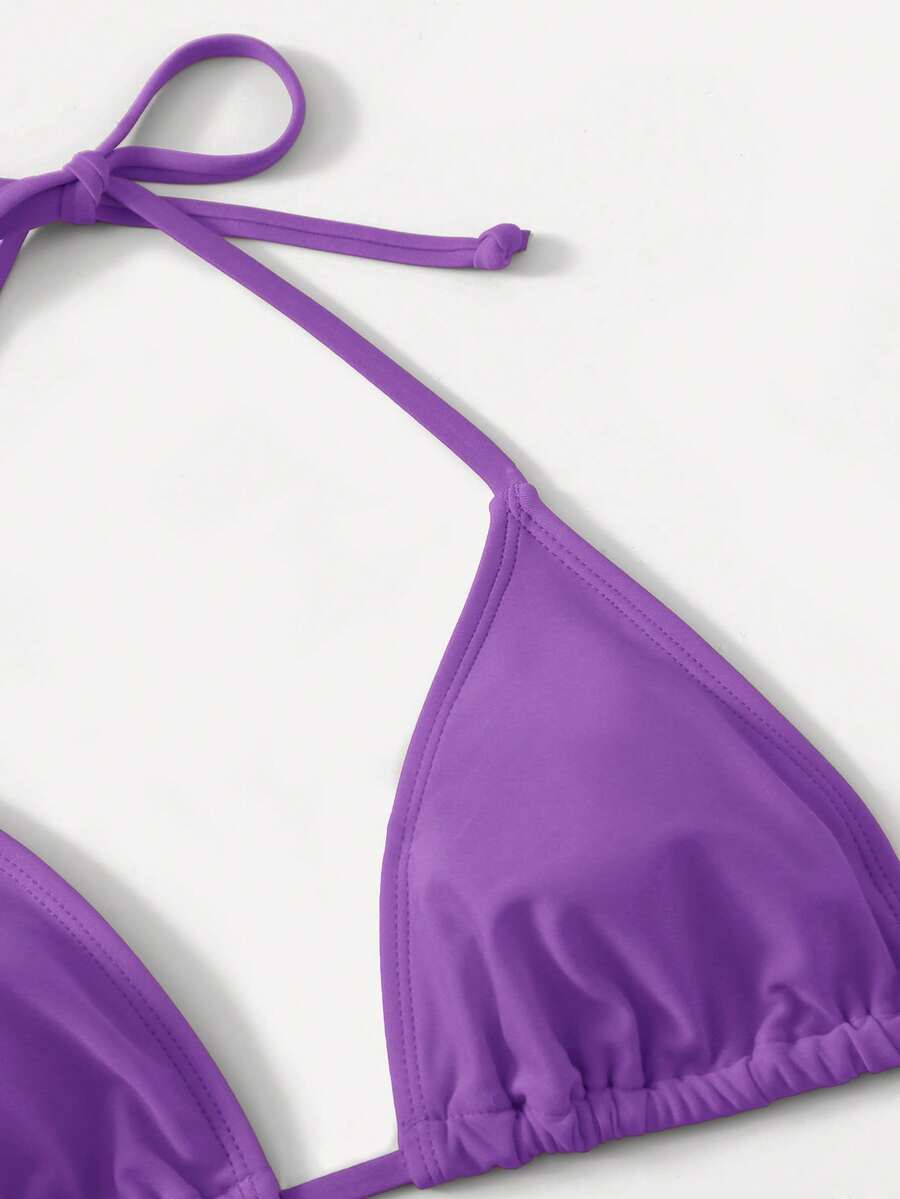 Women's high waist halter tie bikini swimwear set featuring triangle cups, wireless bra with removable padding, and tie side bottoms.