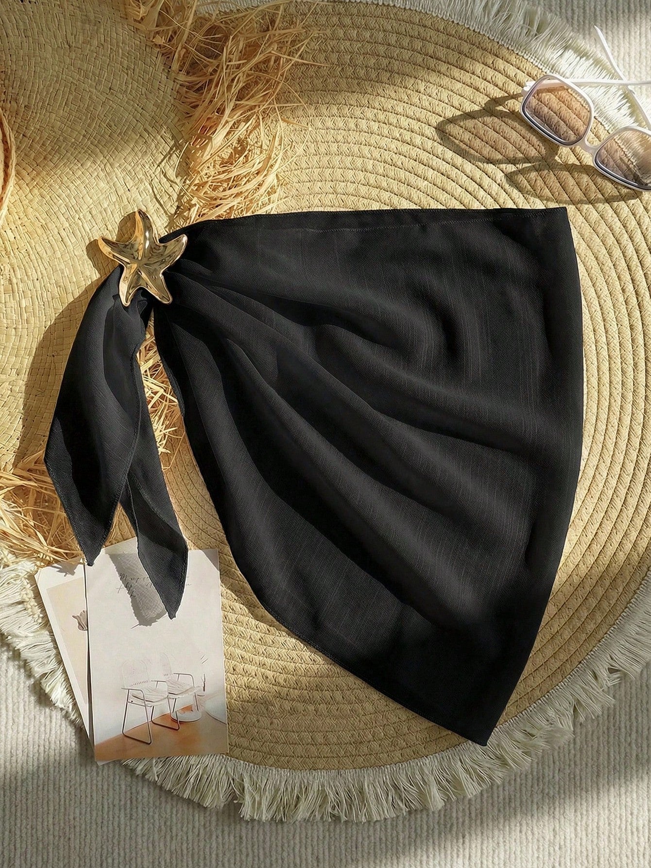 Black sheer beach wrap sarong for tween girls with metal starfish decor and asymmetrical short silhouette