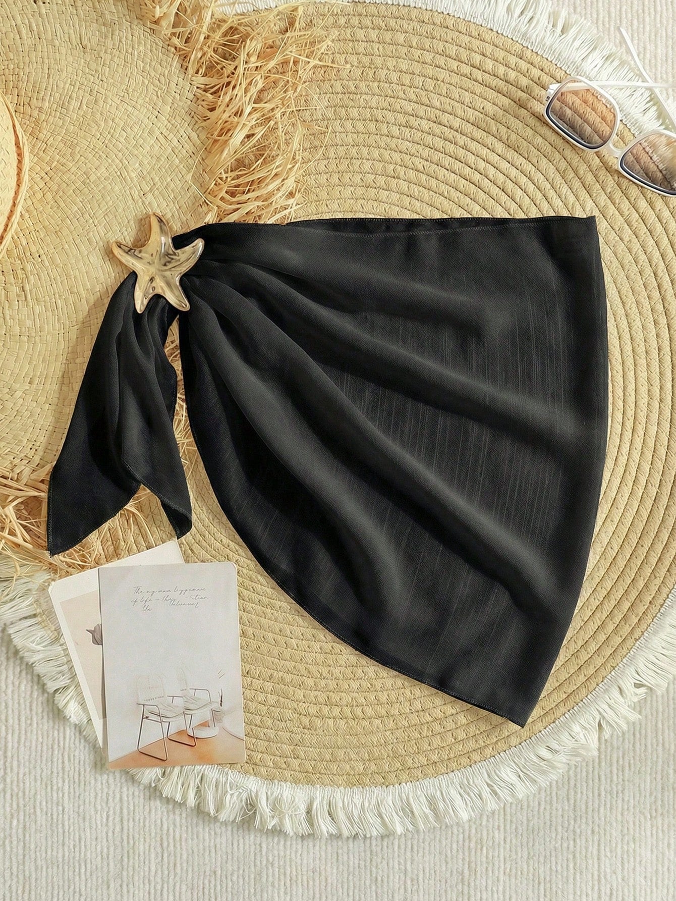 Black sheer beach wrap sarong for tween girls with metal starfish decor and asymmetrical short silhouette