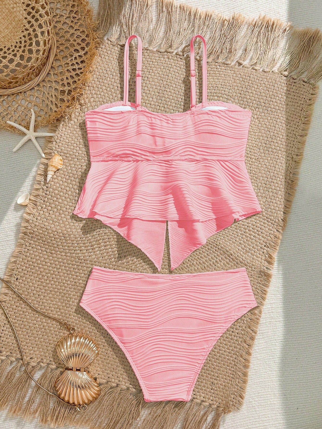 Tween girls 2-piece tankini swimwear set in apricot with a textured jacquard look, asymmetrical spaghetti-strap sleeveless top, and matching mid-waist short bikini bottoms.