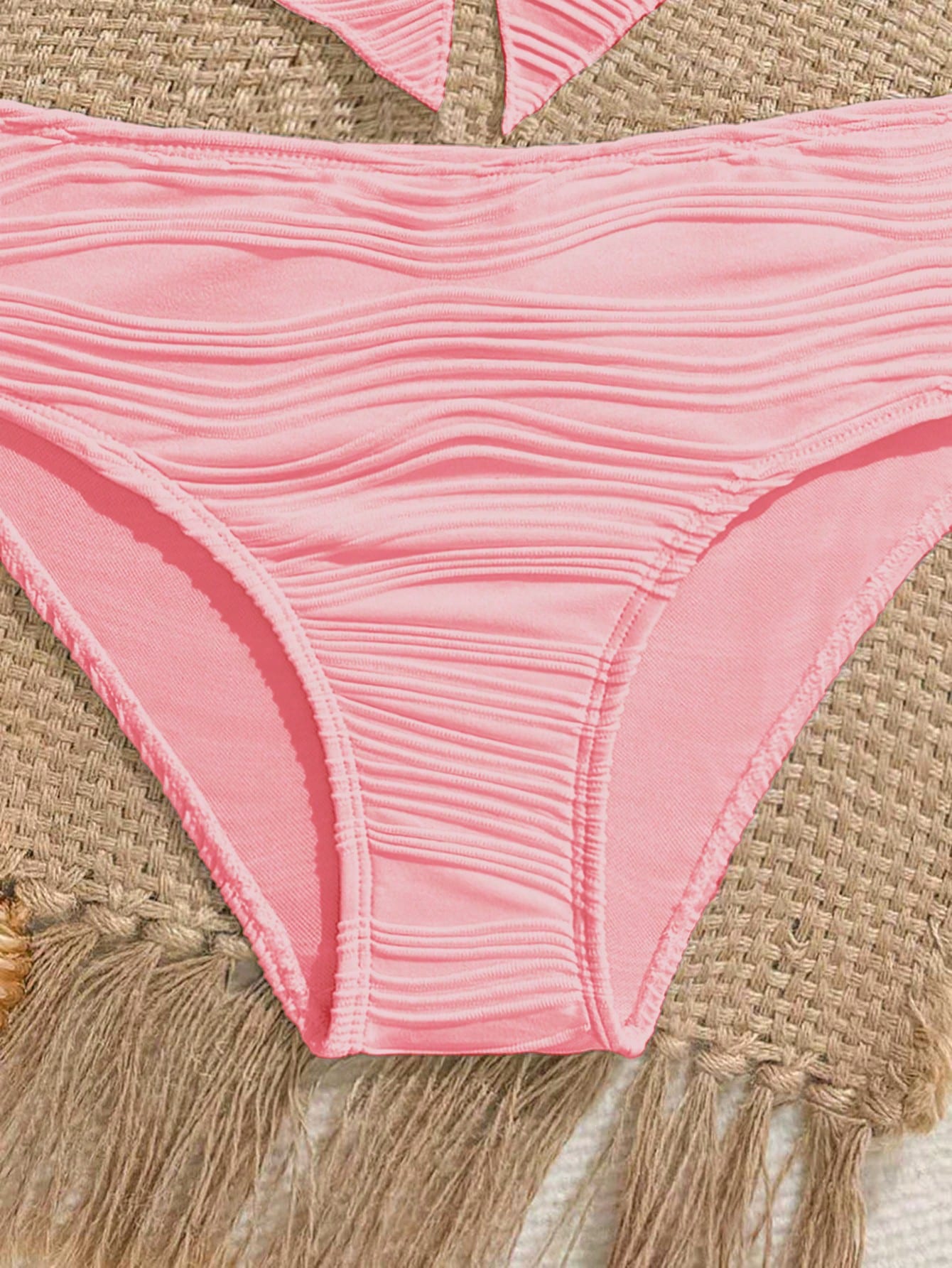 Tween girls two-piece tankini swimwear set with spaghetti straps, asymmetrical design, and 3D rose detail. Features a plant-pattern top and mid-waist bottoms in stretchy fabric for beach or pool wear.
