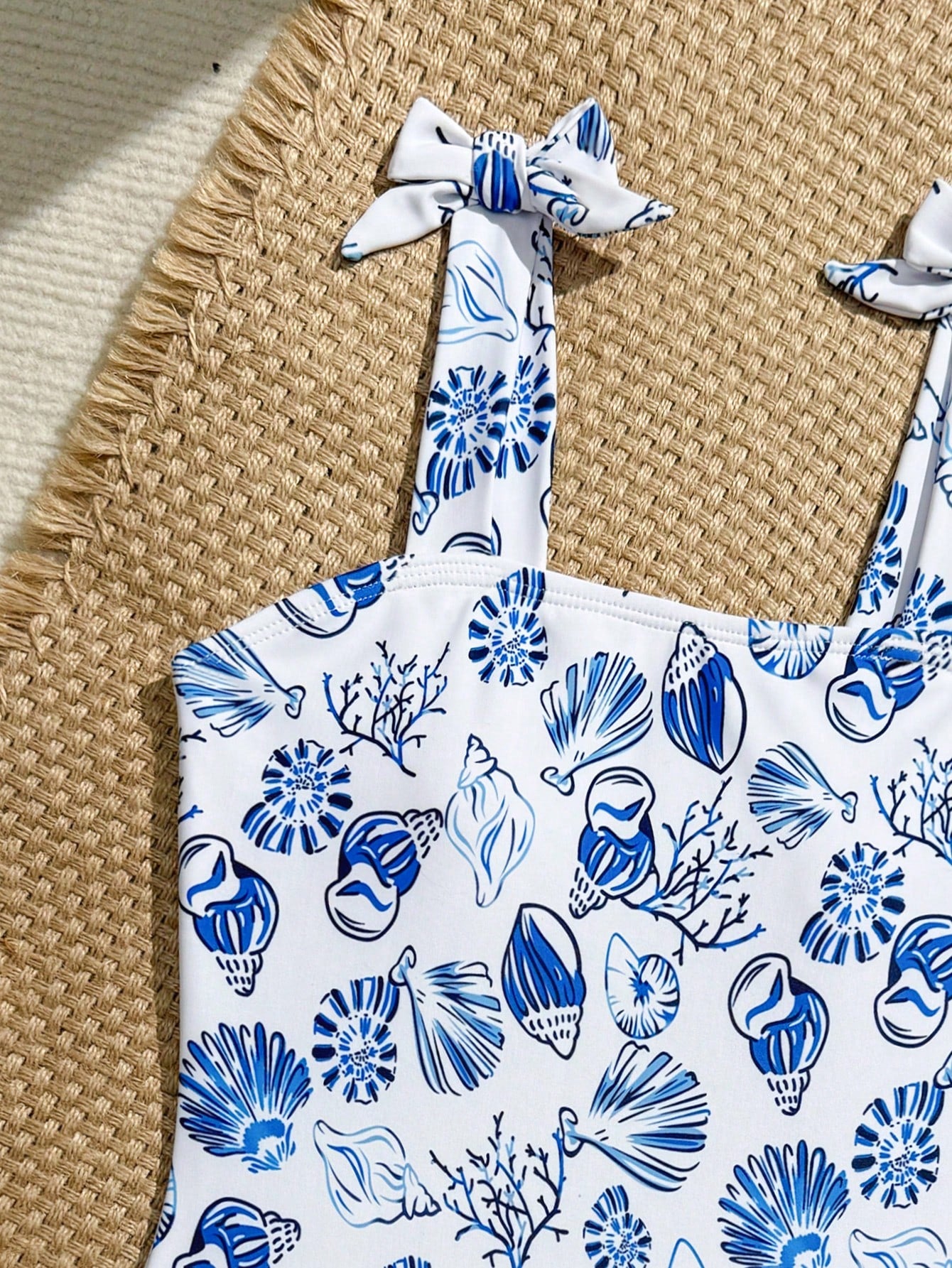 Tween girl one-piece swimsuit with floral plant print, asymmetrical neckline, cut-out detail, and fitted high-stretch design for beach and pool wear