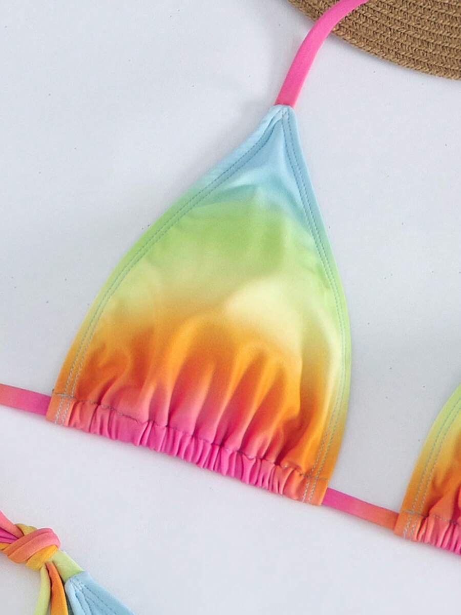 Women's 3-piece gradient bikini set featuring a green halter tie top with removable padding, low waist bottoms, and a matching sheer mesh skirt.