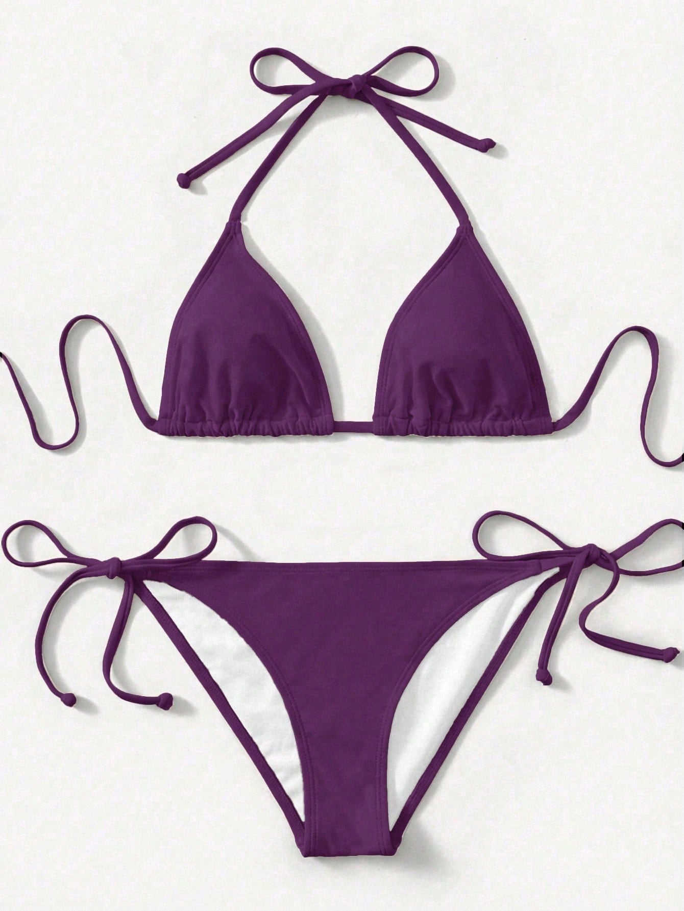 Women's high waist halter tie bikini swimwear set featuring triangle cups, wireless bra with removable padding, and tie side bottoms.