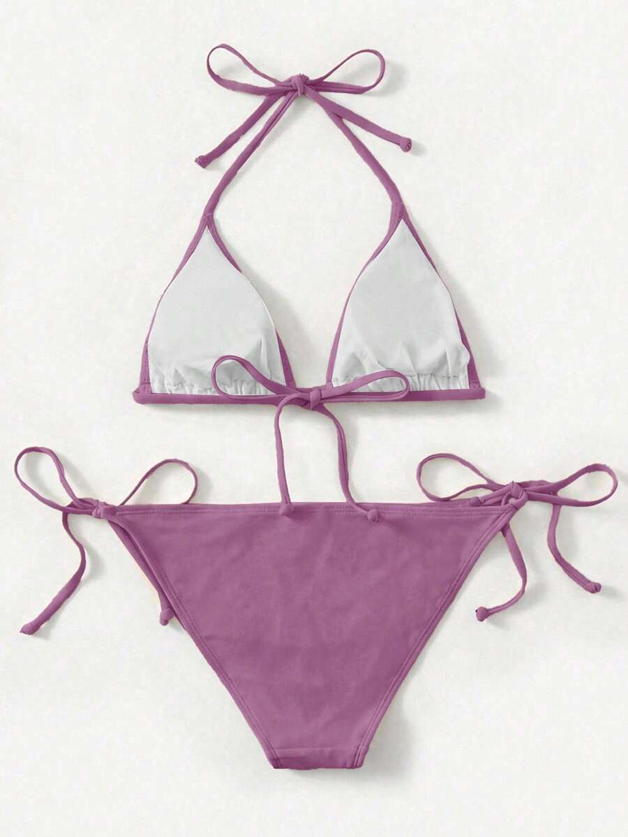 Women's high waist halter tie bikini swimwear set featuring triangle cups, wireless bra with removable padding, and tie side bottoms.