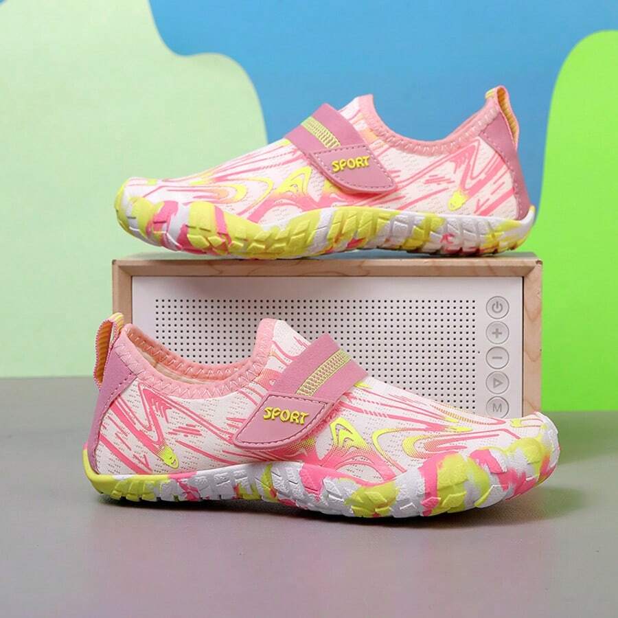 Breathable kids water shoes in white with all-over print, featuring lace-up detail and slip-on design for boys and girls.