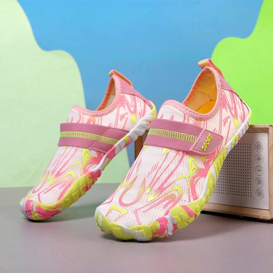 Breathable kids water shoes in white with all-over print, featuring lace-up detail and slip-on design for boys and girls.